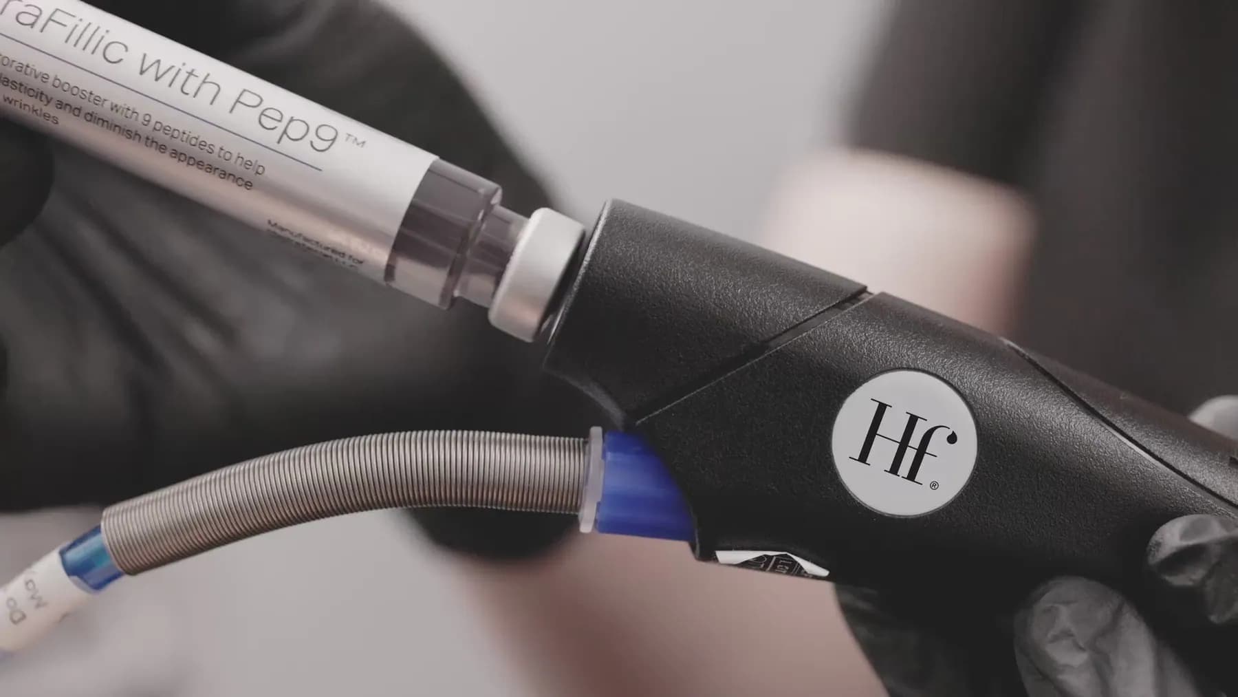 Hydrafacial device and booster serum treatment video still.